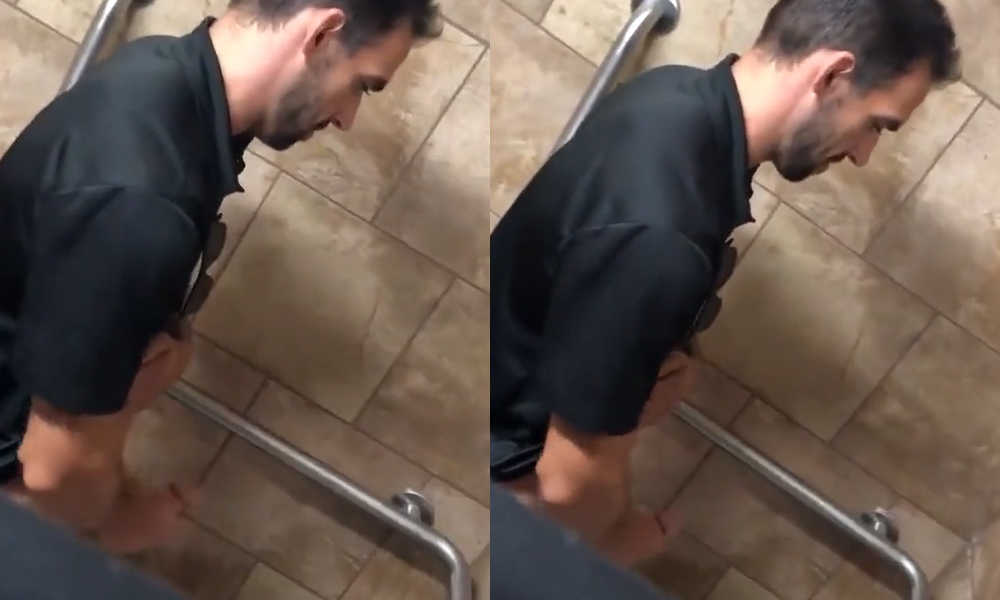 horny guy caught stroking his cock in public toilet