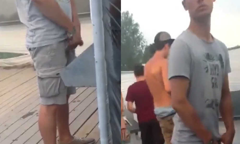 hung guy caught peeing at urinals during a party