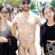 straight guy full frontal naked with clothed girls at WNBR