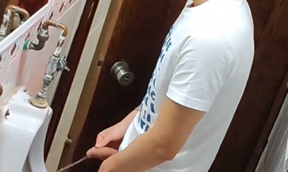 hung guy caught peeing in pub public toilet