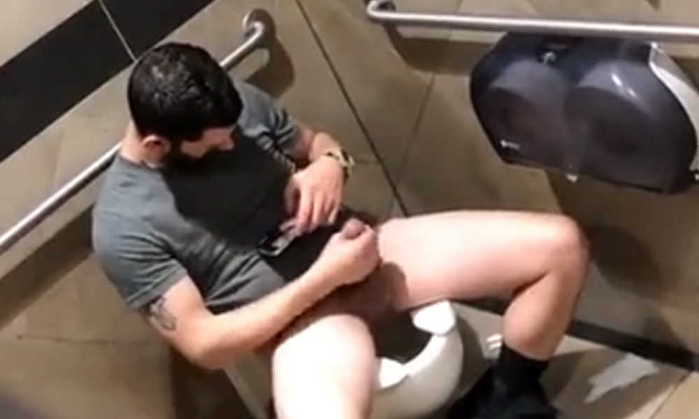 bearded guy caught jerking off in public toilet