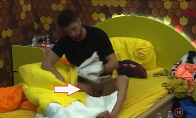 Guy revealing his cock while getting dressed at Big Brother