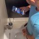 guy jerking off in public toilet while watching porn vids on his mobile phone