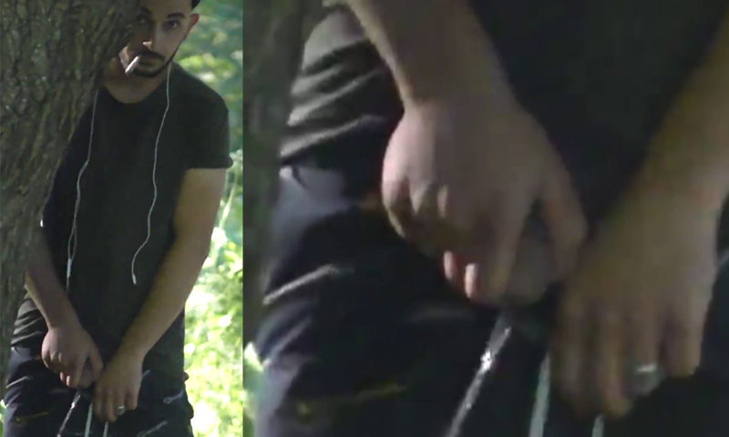 straight guy caught peeing behind a tree in a park