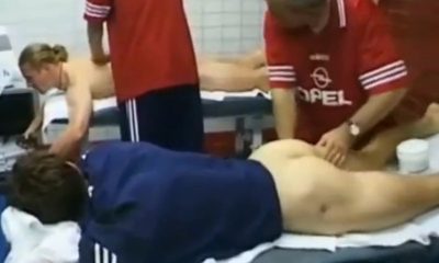 naked footballers receiving a massage