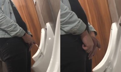 guy with big balls caught peeing at urinals