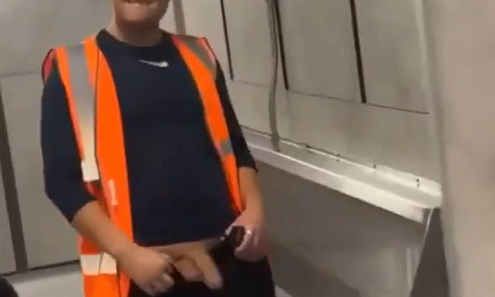 Exhibitionist guy showing off his huge dick in a public restroom