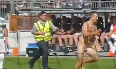 Completely naked streaker on football pitch