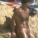 Muscle nudist captured naked on video at the beach