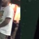 Guy caught peeing in a bin in the street