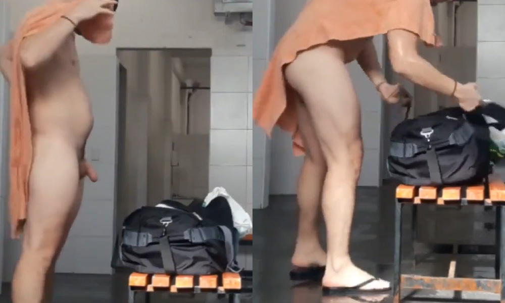 Guy drying off in the gym locker room