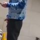 Hung lad caught taking a leak at urinals