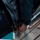 Sexy dude pulling out his big dick and peeing at urinals