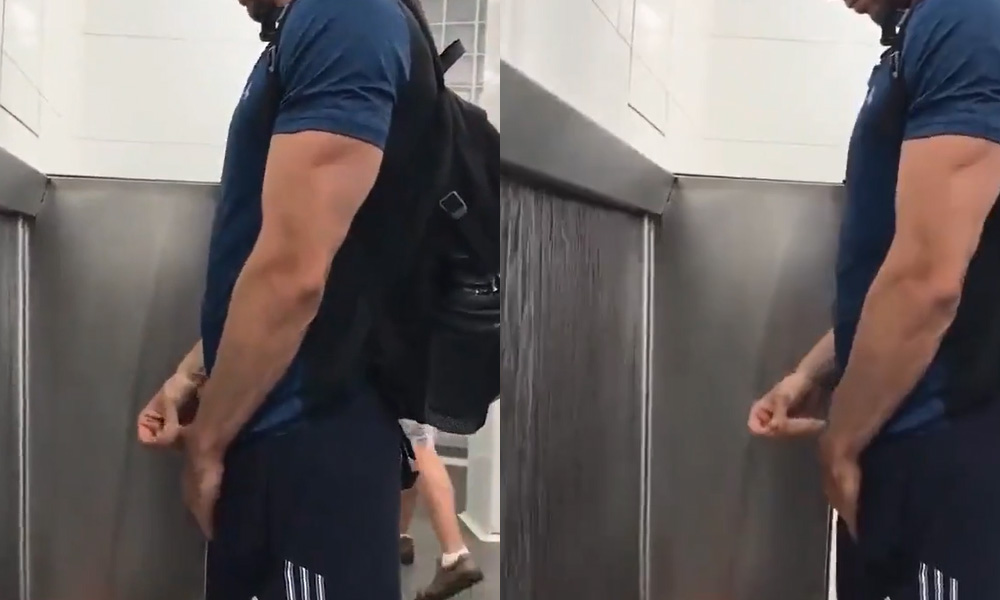 Hot guy peeing and stretching his dick at urinals