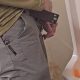 Hung man caught peeing at urinals
